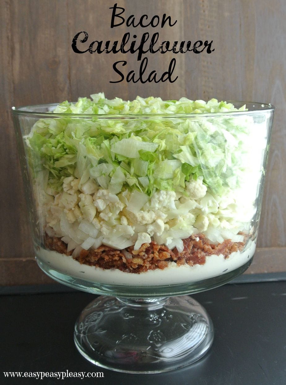 Bacon Cauliflower Salad is a huge hit and feeds a crowd! Assemble in layers ahead of time and mix all together right before serving.