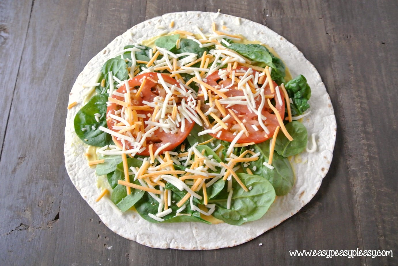 How to make a picture perfect wrap. Shredded or sliced cheese work equally well.