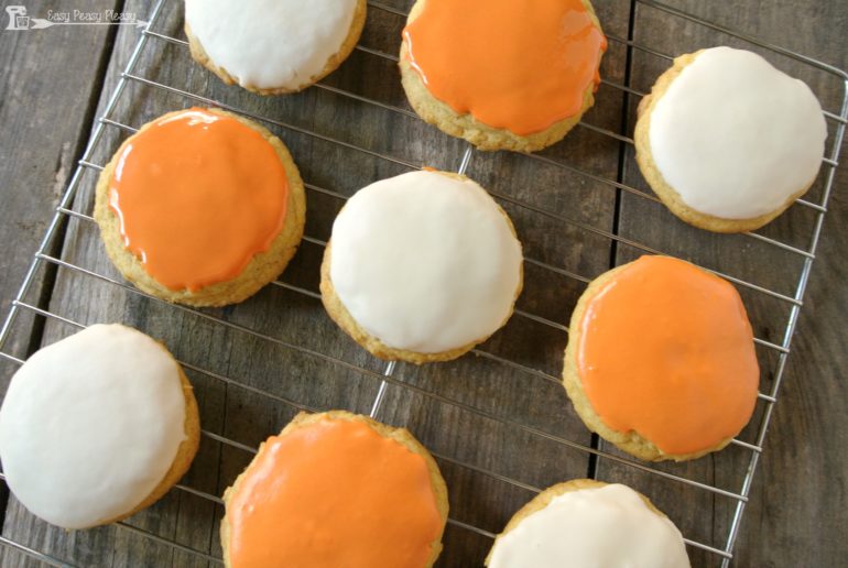 Make these easy glazed pumpkin cookies using only 4 ingredients total. If you have a box of cake mix and some store bought frosting this recipe is for you!