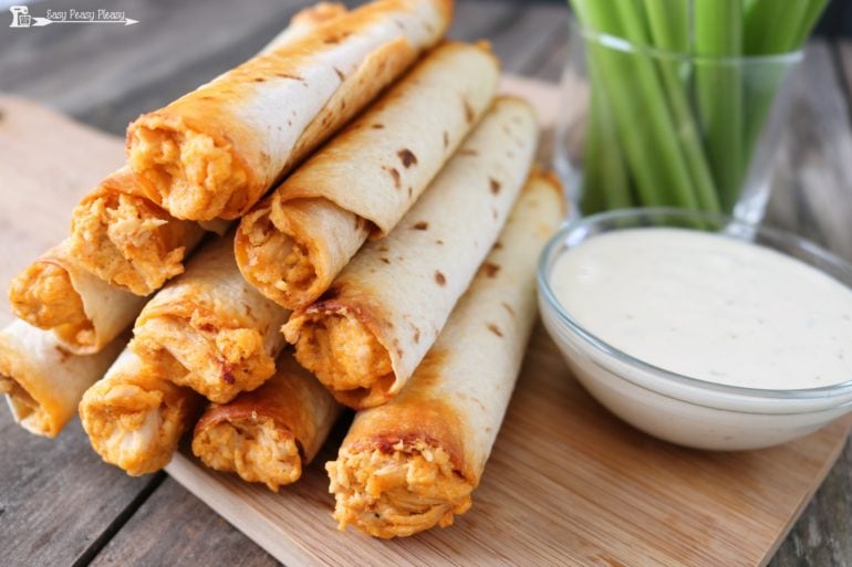 Buffalo Chicken Taquitos for the win! The perfect handheld appetizer for any party. Transform the classic Buffalo Chicken Dip with this recipe.