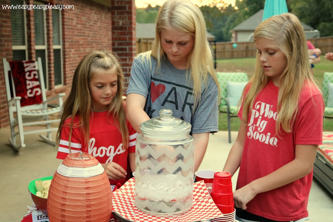 Set up a hydration station for the kids on game day.