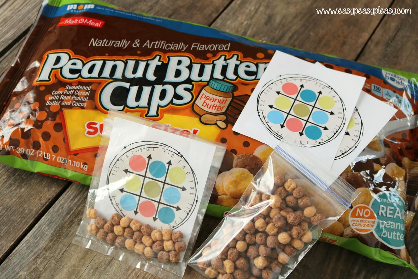 (AD) Peanut Butter Cups Cereal from Malt O Meal make the perfect X's and O's for this free printable tic tac toe lunchbox game.