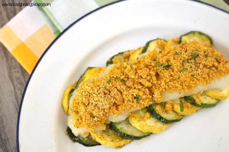 Bake up this super easy and delicious Parmesan Breaded Crappie Recipe over summer vegetables.