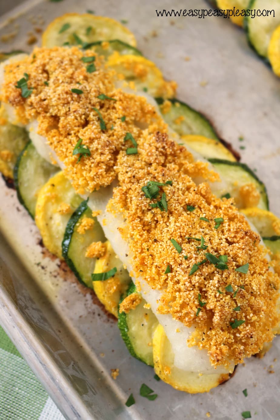 Parmesan Breaded Crappie Recipe over Summer Vegetables is a delicious way to eat crappie.