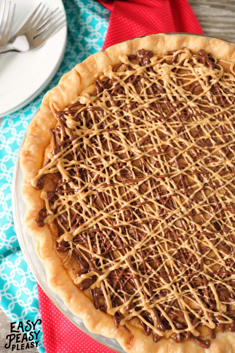 Peanut Butter Chip Chocolate Chip Cookie Pie is the perfect dessert for cookie and pie lovers.