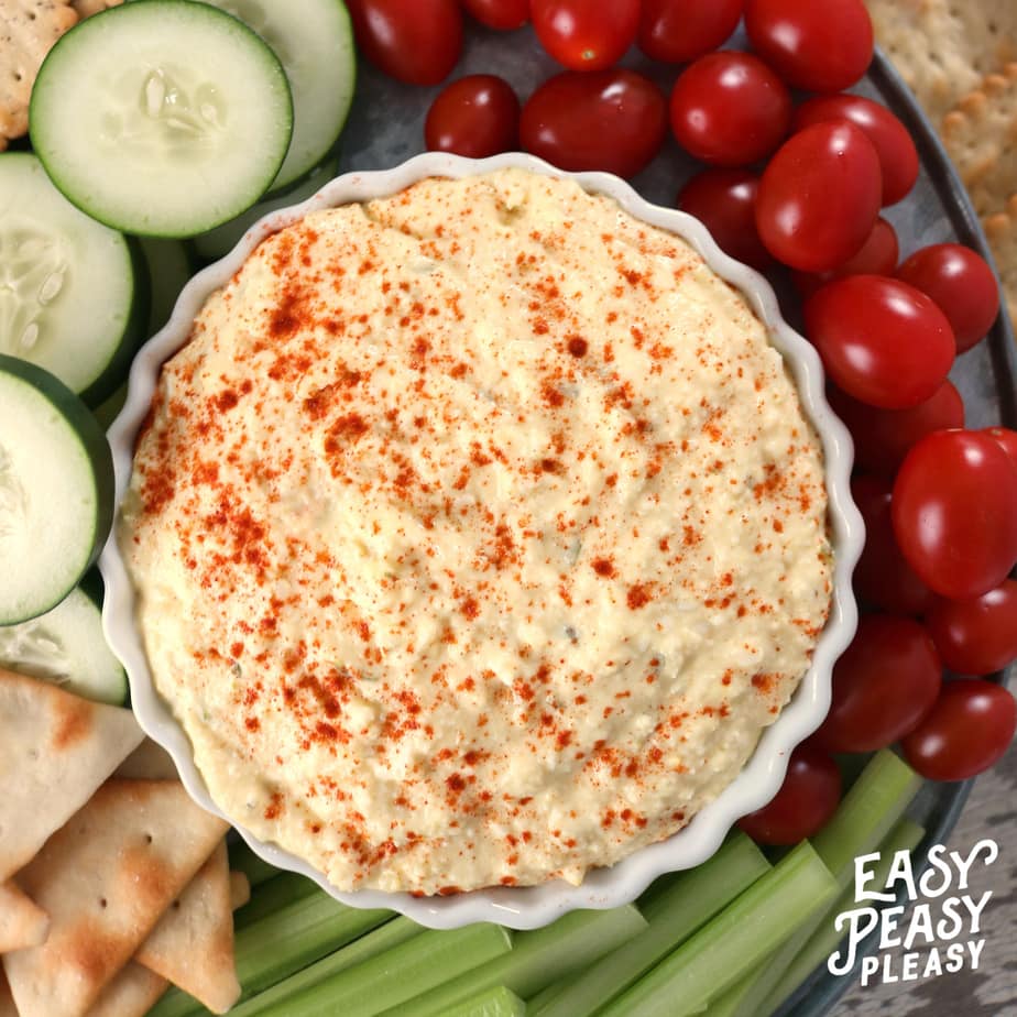 The perfect dip for holidays or any occasion. Classic Deviled Egg Dip will be a hit. #deviledegg #deviledeggs #deviledeggdip