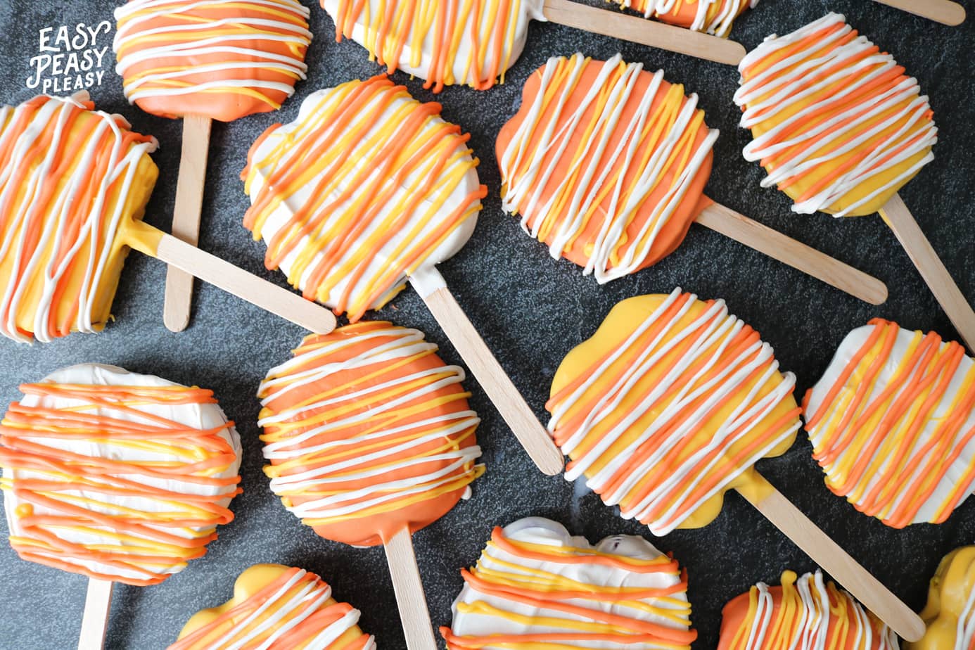 Easy 2 Ingredient Candy Apple Slices on a stick perfect for Halloween.