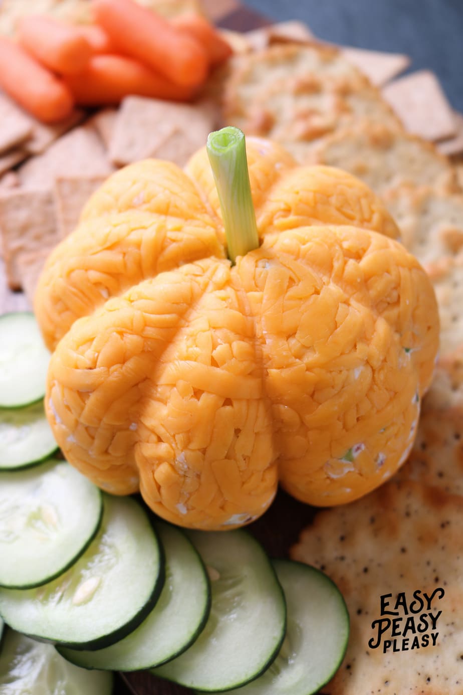 Easy 4 Ingredient Cheeseball Pumpkin for Halloween and Thanksgiving. #cheesball #thanksgivingcheeseball #halloweencheeseball