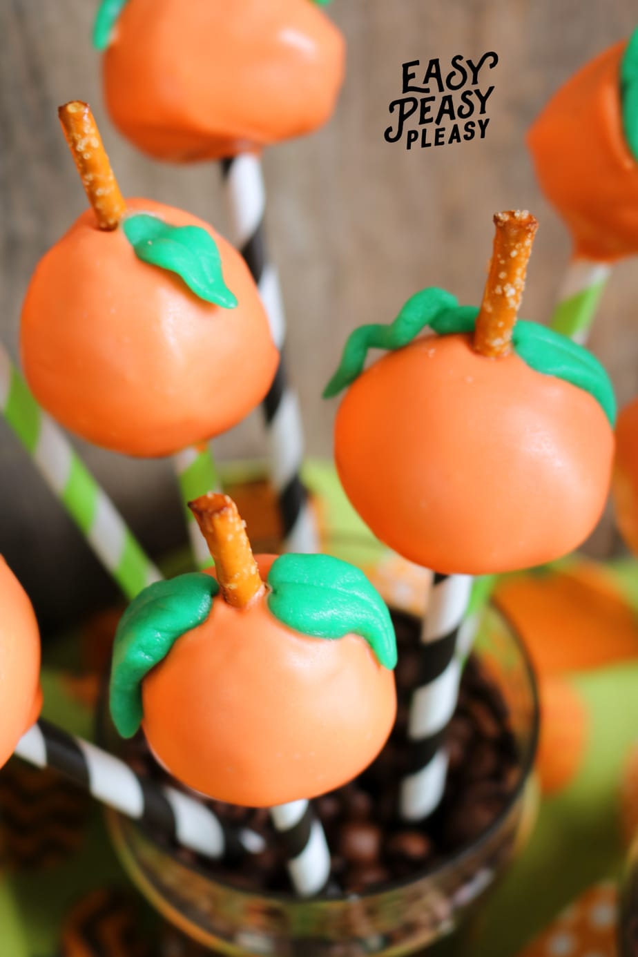 Grab these easy 5 Ingredients to whip up cute Donut Hole Pumpkin Pops perfect for fall and Halloween.