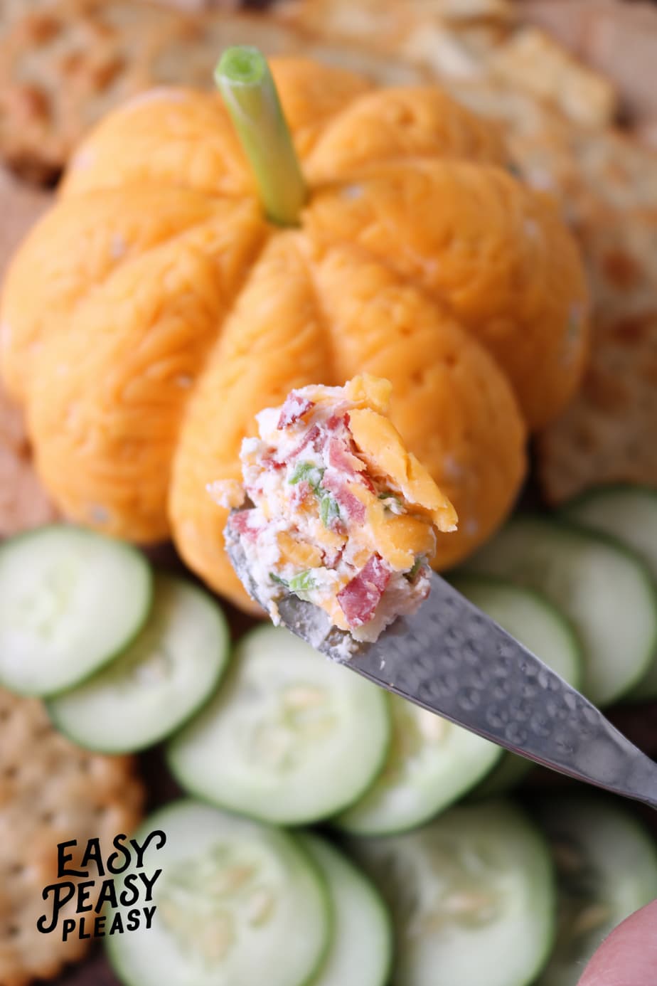 This Easy 4 Ingredient CHEESEBALL PUMPKIN is just like my always asked for original cheeseball but shaped like a pumpkin. #cheeseball #halloweencheeseball #thanksgivingcheeseball